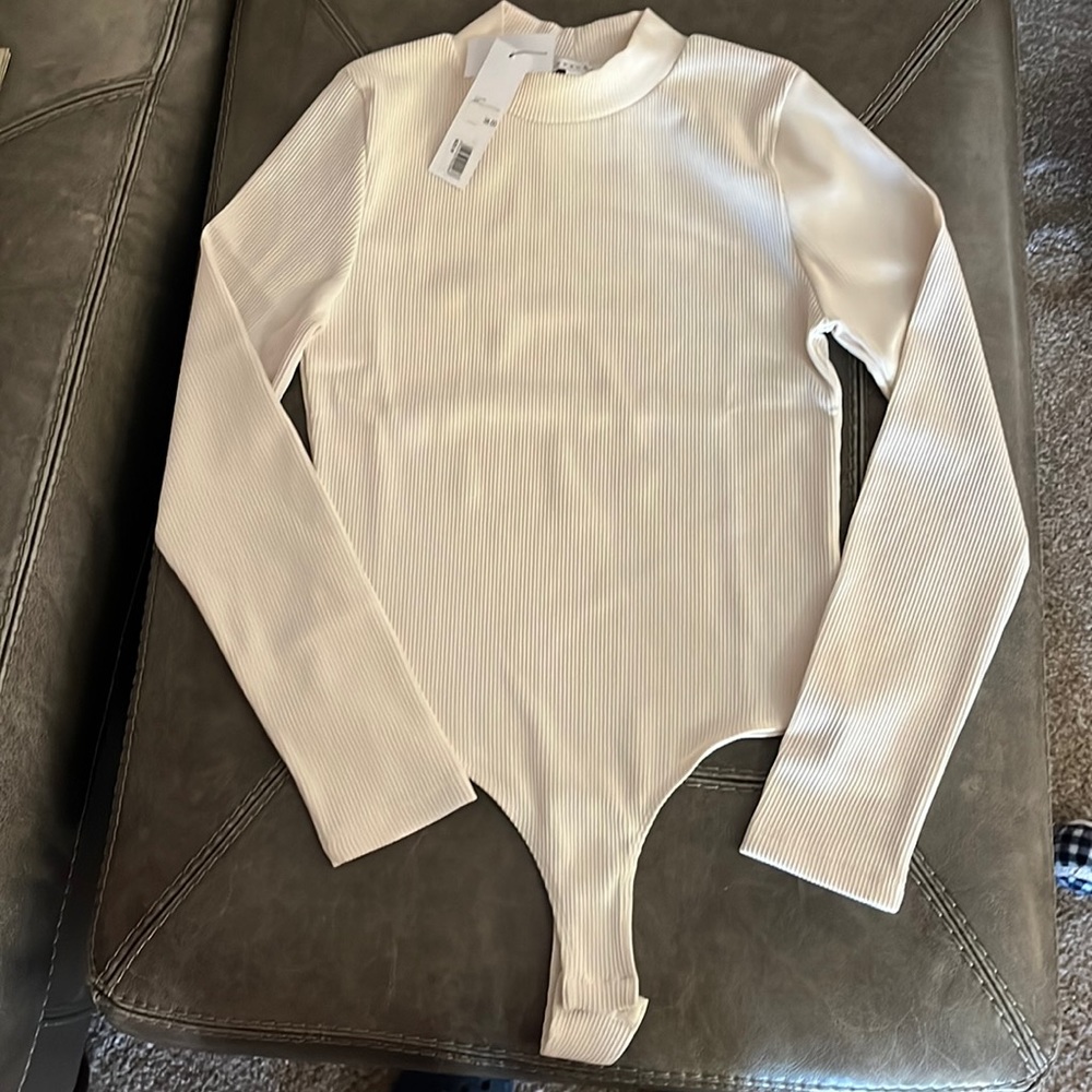 Women’s long sleeve mock turtleneck body suit